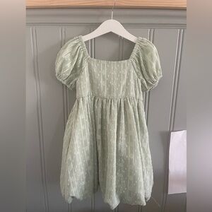 Mint green toddler dress in good condition.